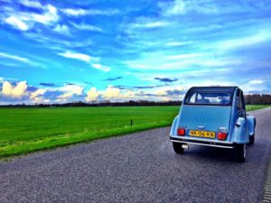 In een lelijke eend op wereldreis door Nederland